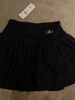ALO Yoga Black Pleated Skirt with Embroidered Logo